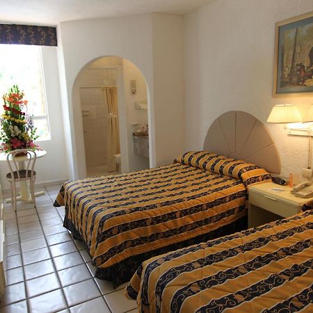 Hotel Plaza Caribe Канкун Экстерьер фото