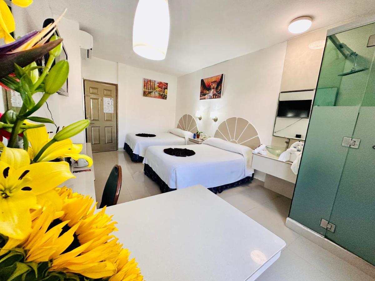 Hotel Plaza Caribe Канкун Экстерьер фото