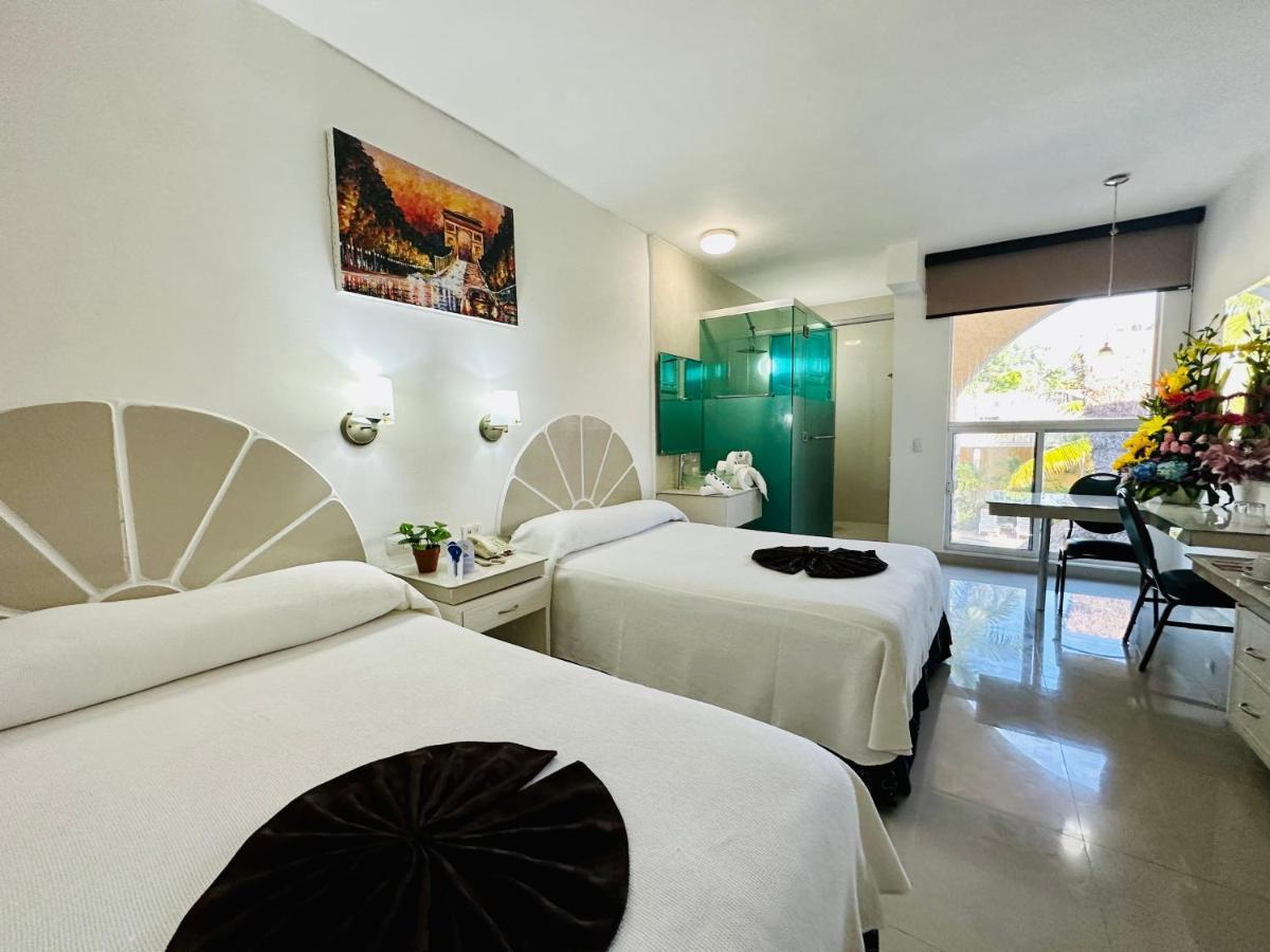 Hotel Plaza Caribe Канкун Экстерьер фото