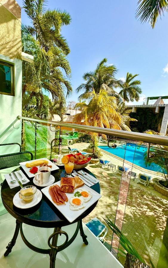 Hotel Plaza Caribe Канкун Экстерьер фото