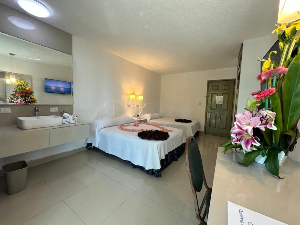 Hotel Plaza Caribe Канкун Экстерьер фото