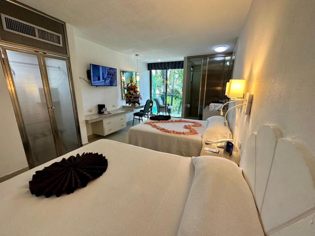 Hotel Plaza Caribe Канкун Экстерьер фото