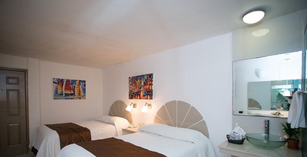 Hotel Plaza Caribe Канкун Экстерьер фото